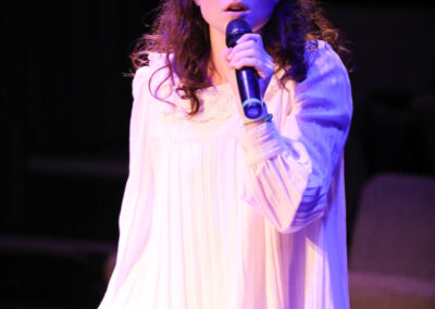 Student sings a solo in BAAY's Spring Awakening at the Mount Baker Theatre