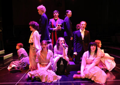 Students in BAAY's Spring Awakening in the middle of a group song at the Mount Baker Theatre