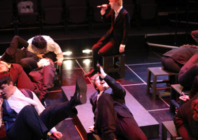 Students in BAAY's Spring Awakening in the middle of dance choreography at the Mount Baker Theatre
